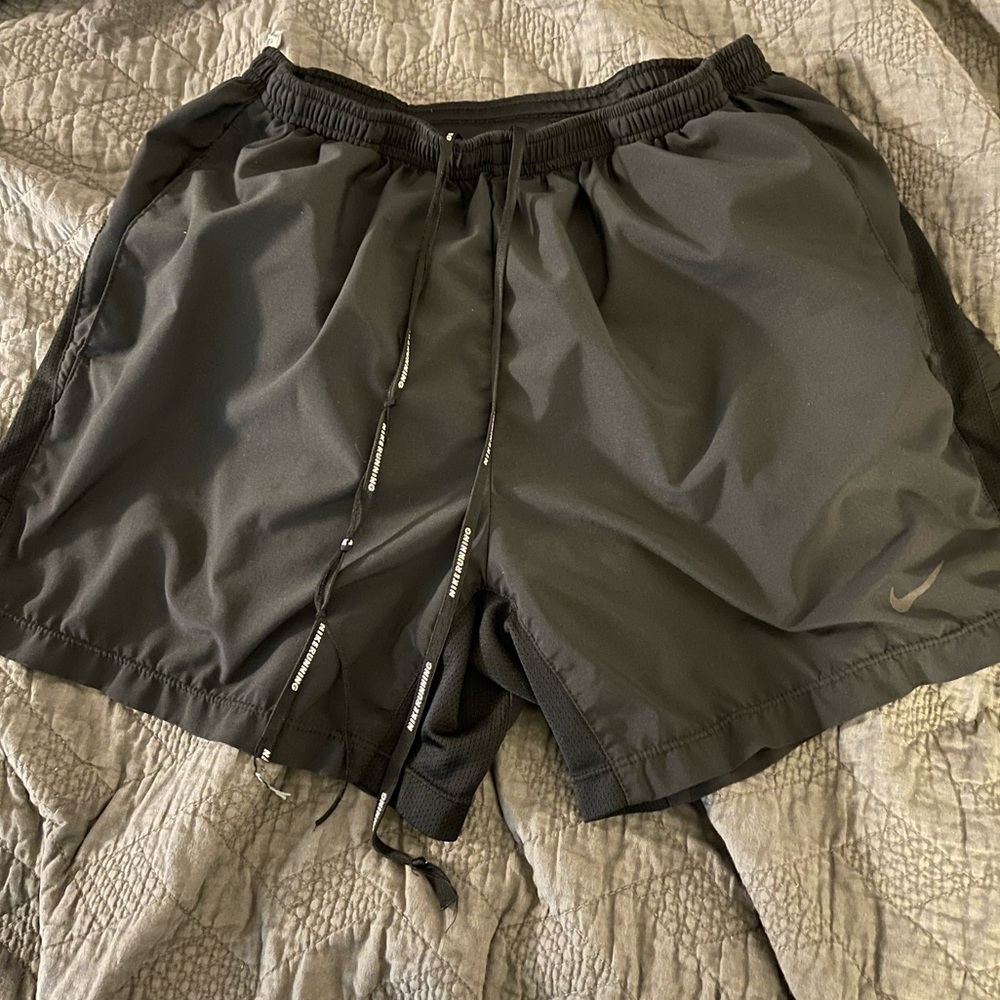 Women’s Nike Dri Fit running shorts. Size Medium